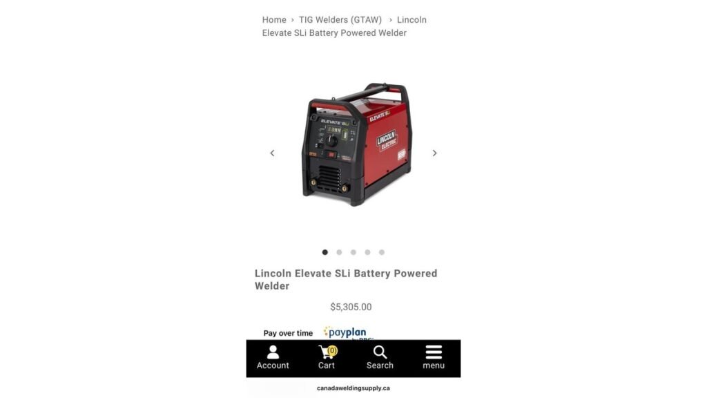 Portable battery powered welder on garage floor with helmet and gloves